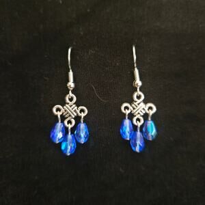 Antique silver Celtic knot and iridescent blue teardrop chandelier earrings